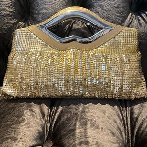 Brand new gold evening clutch